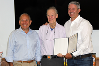 Dylan Lissette, CEO and Michael Rice, Chairman Emeritus Utz Brands, Inc. accept the 100 Year anniversary congressional record from Congressman Lloyd Smucker. Source: Utz Brands, Inc.
