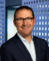 David L. Cummings, SVP and Chief Commercial Officer, Benchmark