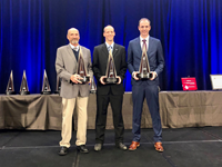 (L-R) Fluor’s Rocky Plemmons, Justin Lamb and Kevin Anderson with Fluor’s three 2021 CURT awards recognizing the company’s Advanced Technologies & Life Sciences projects. (Photo: Business Wire)